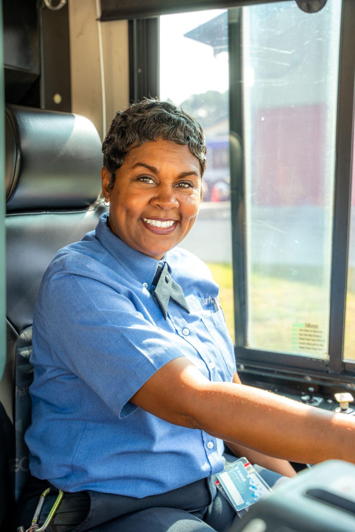 smiling transit driver