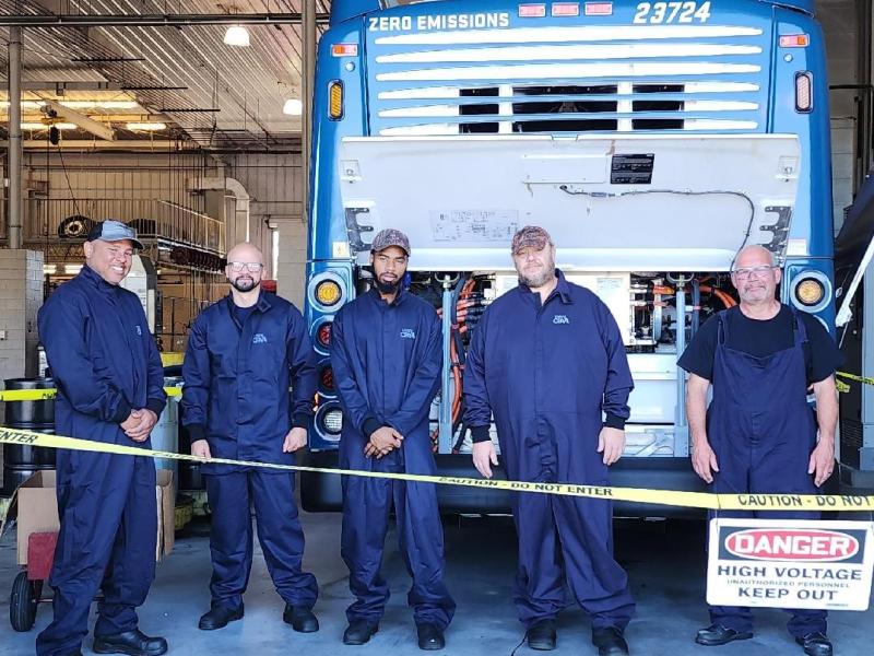 Maintenance staff at COMET with new hydrogen bus